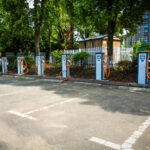Leveraging Investments in Electric Vehicle Charging Stations to Maximize Public Benefits