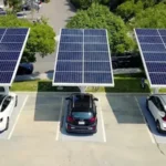Electric vehicle charging at a solar-powered station 2025