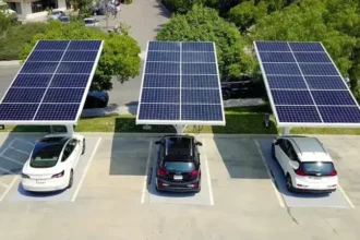 Electric vehicle charging at a solar-powered station 2025